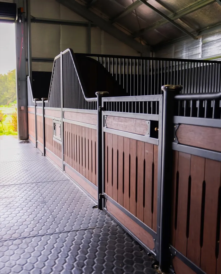 Elite Equine stable fit-out with timber fronts and rubber matting