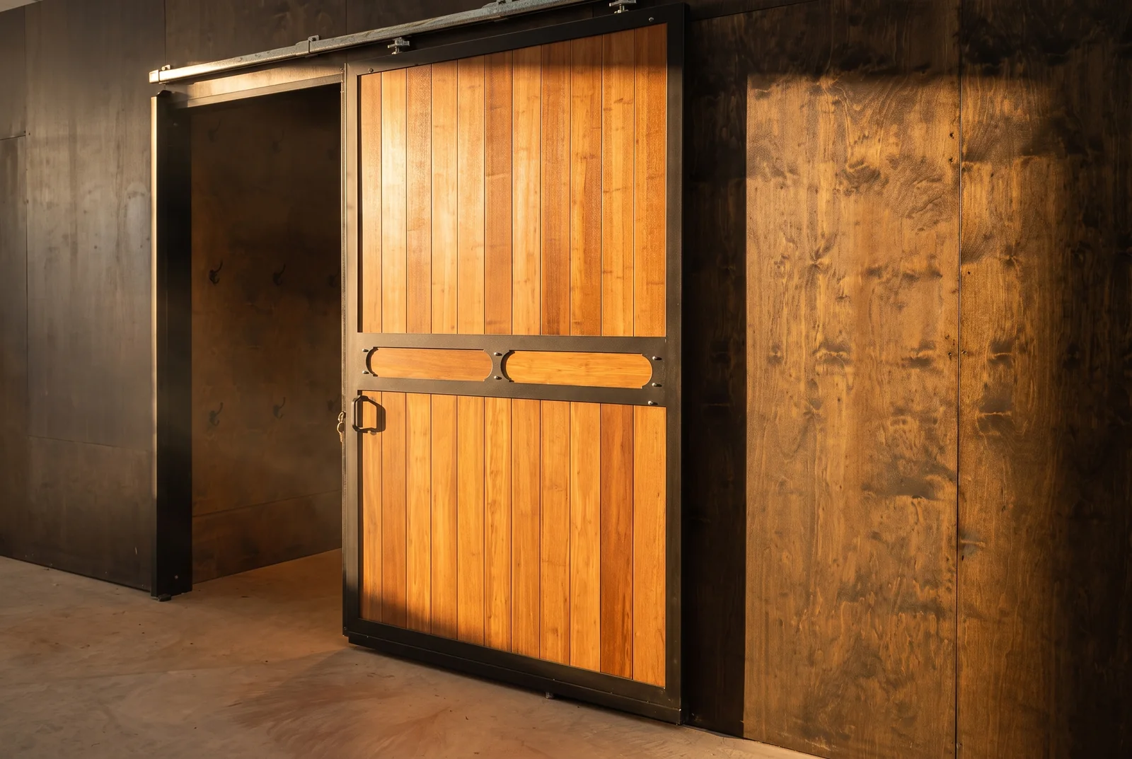 A timber external stable door in a steel frame